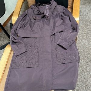 Mauve colored Lululemon raincoat